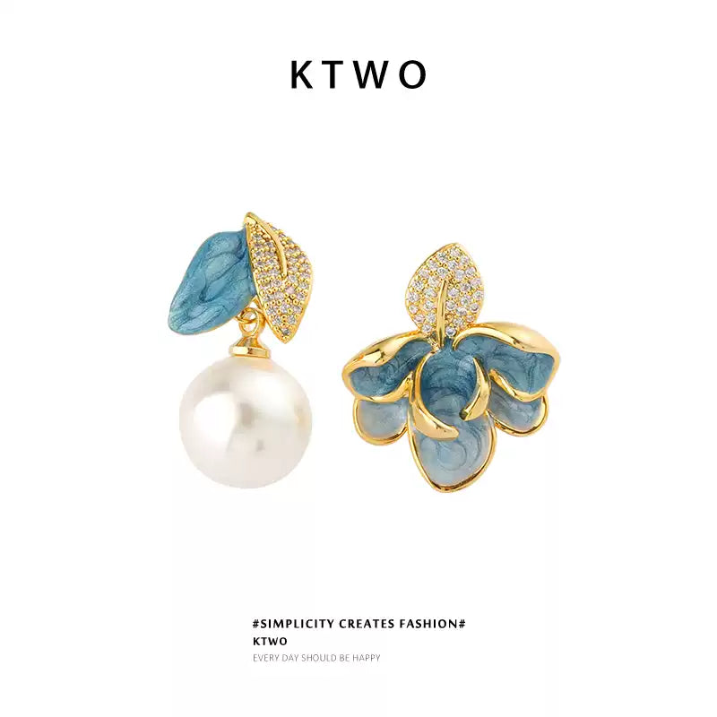 Asymmetric drip glaze enamel leaf earrings with a fresh water pearl dangle for women.