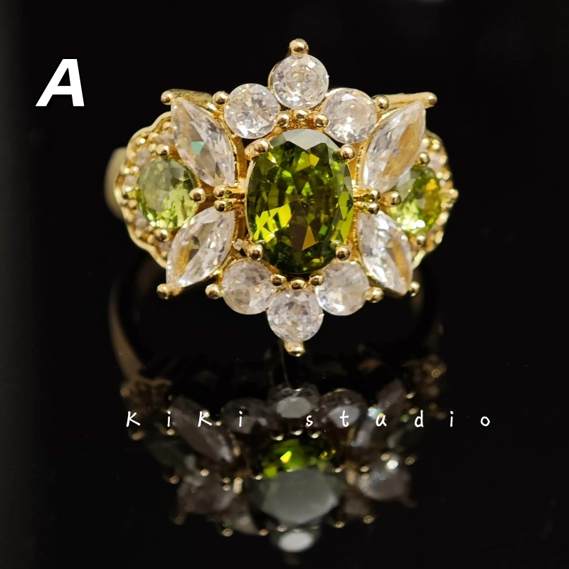 Close-up detail shot of the intricate geometric patterns and rich olive green finish on this adjustable statement ring.