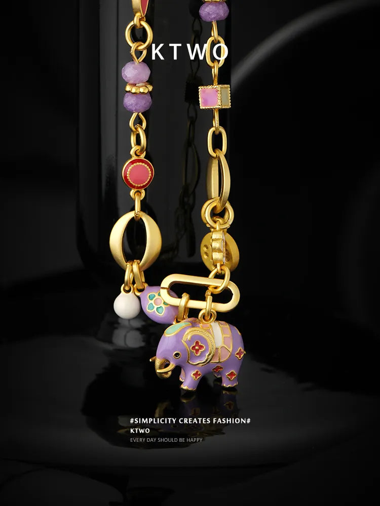 close range close-up drip glaze purple elephant charm