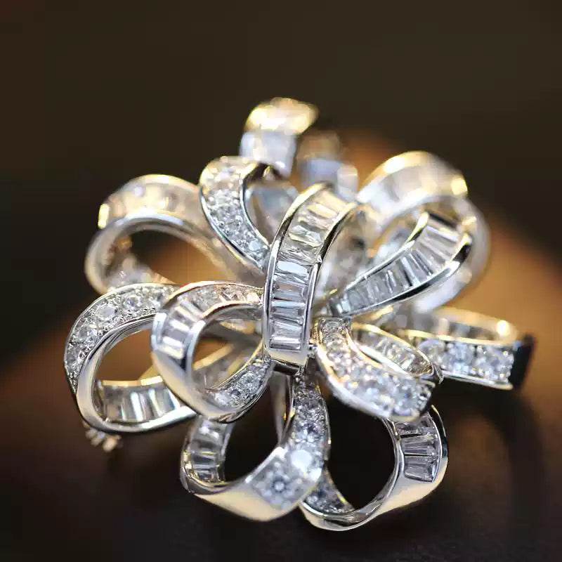 Close-up detail of the crystals on the ribbon brooch