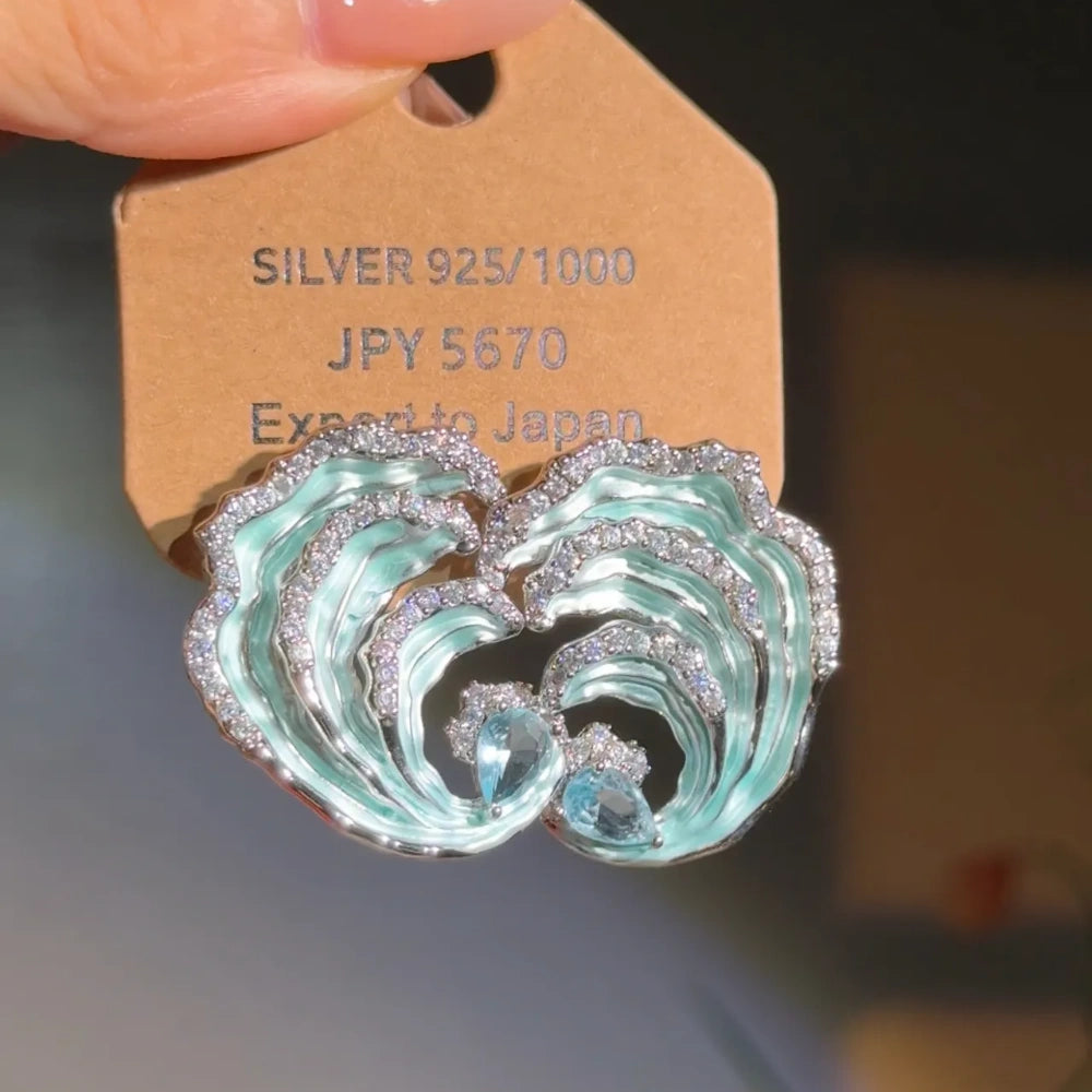 ocean wave earrings with zircon stones and sterling silver posts

