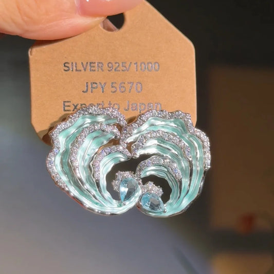 ocean wave earrings with zircon stones and sterling silver posts

