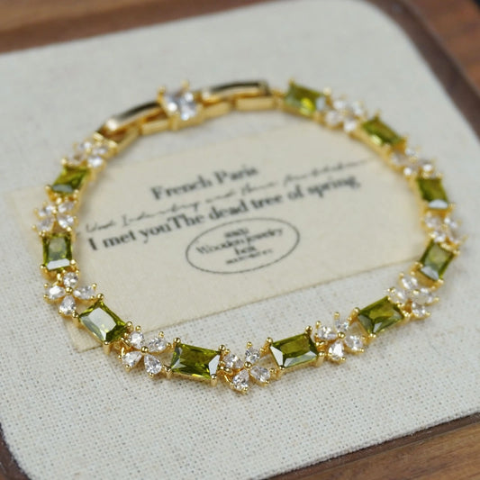 Olive Green Forest French Bracelet with zircon charm elegantly displayed on a beige background, perfect for everyday style.