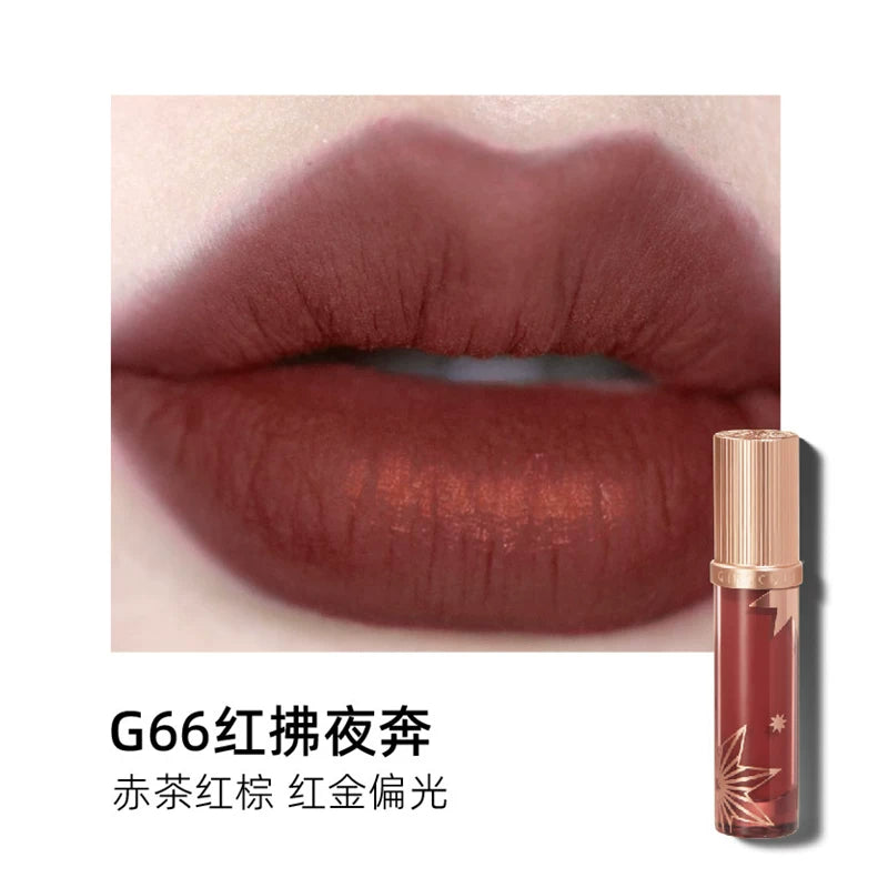 Swatch of Girlcult Lipstick G66: A rich red-brown base transforms with a luxurious metallic shift from red to gold, perfect for elevating your look from day to night.