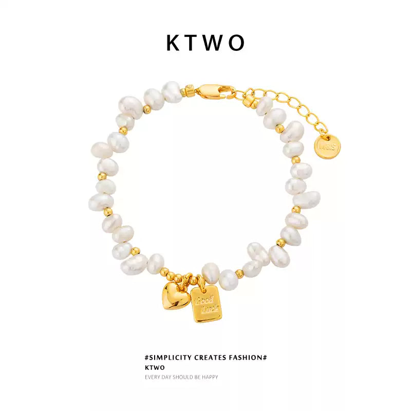 Gold heart charm bracelet with natural freshwater pearl
