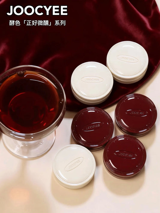 Side view of the JOOCYEE multi-use balm pot, showcasing its compact size.