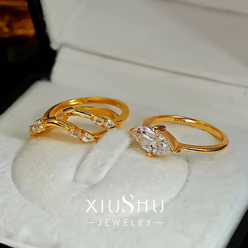 The dainty sterling silver stacking ring set with high-quality crystals.