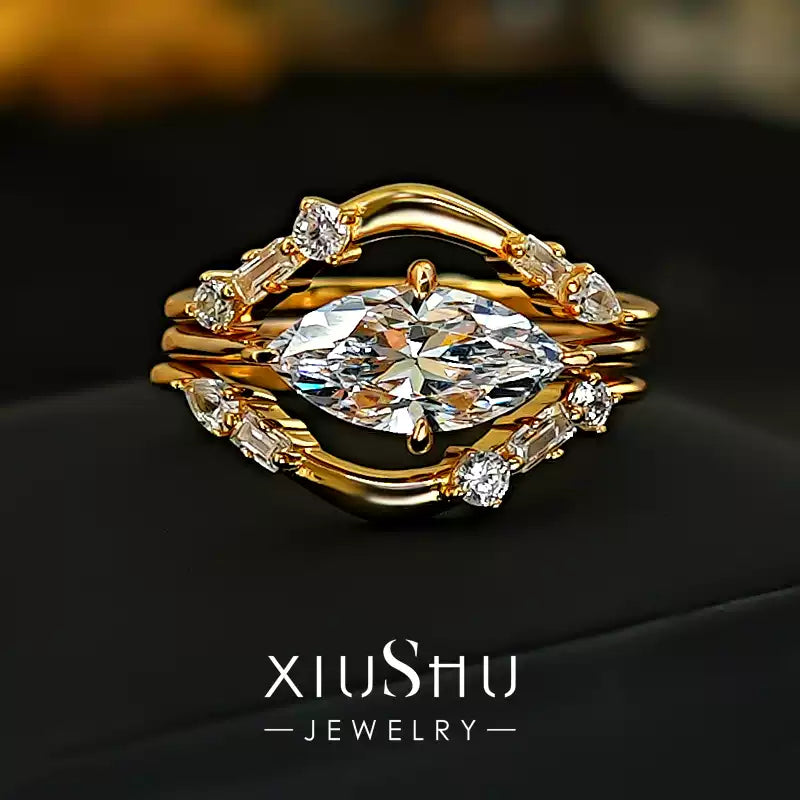 The stackable crystal rings showcasing exceptional sparkle and fire on a sleek black background, highlighting their luxury appeal.