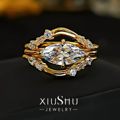 The stackable crystal rings showcasing exceptional sparkle and fire on a sleek black background, highlighting their luxury appeal.