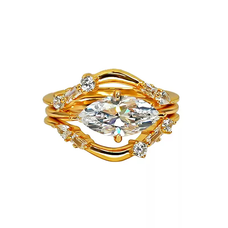 The complete 3-piece set of sparkly stackable crystal rings, made of 925 sterling silver, isolated on a clean white background.