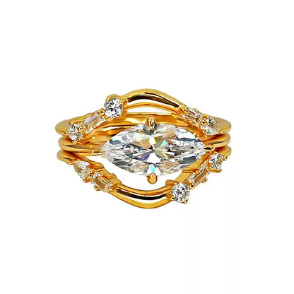 The complete 3-piece set of sparkly stackable crystal rings, made of 925 sterling silver, isolated on a clean white background.