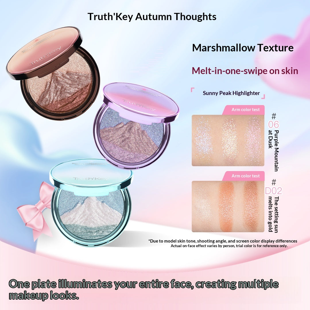 Blended color swatches of the buildable, tri-tone Sunlit Peaks highlighter